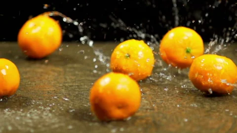 Washing Orange Fruit Slow Motion Stock Footage 130299082