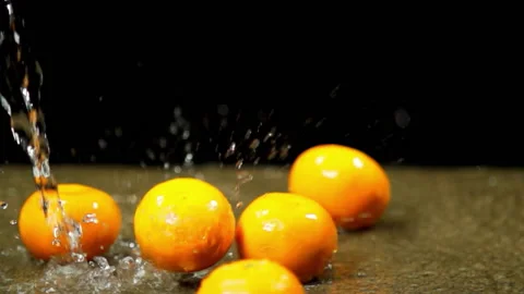 Washing Orange Fruit Slow Motion Stock Footage 130299160