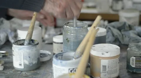 Washing paint brushes Stock Footage 12601490