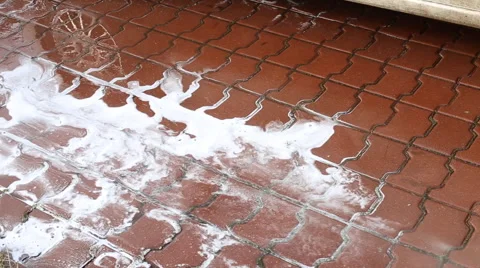 Washing the pavement with water Stock Footage 62113976