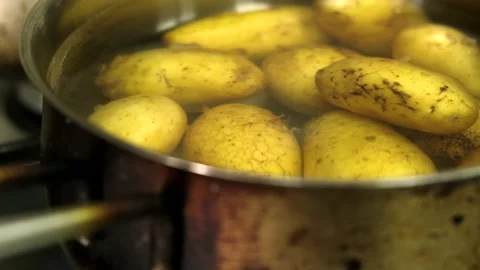 Washing potatoes in the sink Stock Footage 201864837