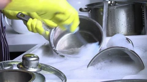 Washing pots and pans Stock Footage 8573288