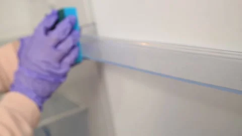 WASHING THE REFRIGERATOR Stock Footage 155654819