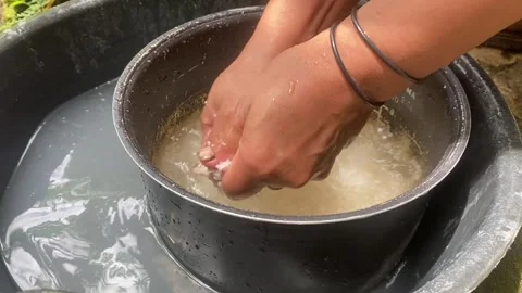 Washing rice grains Stock Footage 303085343