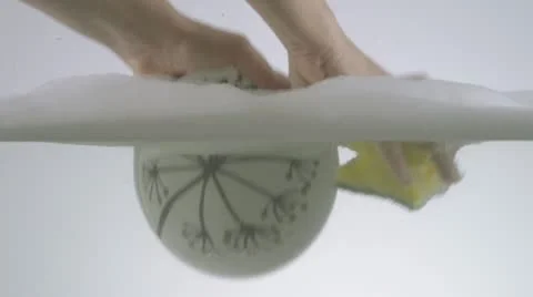 Washing Small Serving Bowl In Slow Motion Stock-Footage 11518619