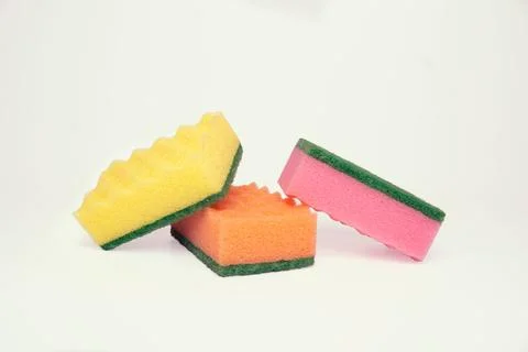 Washing sponge on a white background. Stock Photos