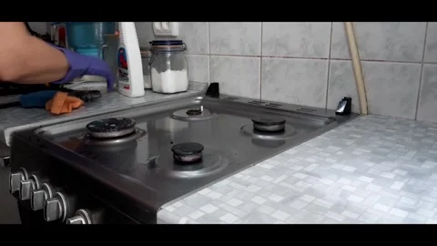 Washing the stove. Stock Footage 288014907