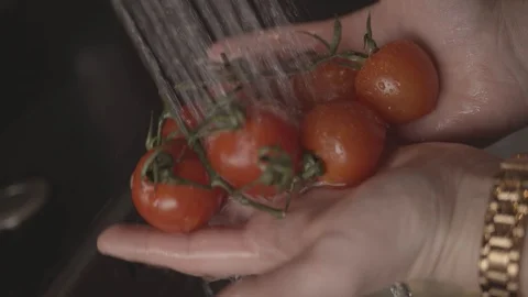 Washing tomatoes Stock Footage 125870213