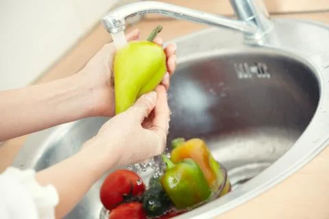 Washing vegetables Stock Photos