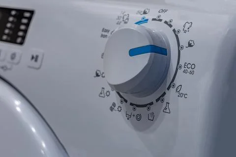Washing in a washing machine, ecological program, saving energy and water Stock Photos