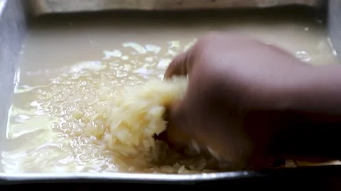 Washing white rice Stock Footage 157737498