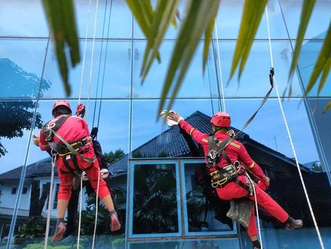 Washing window worker Stock Photos
