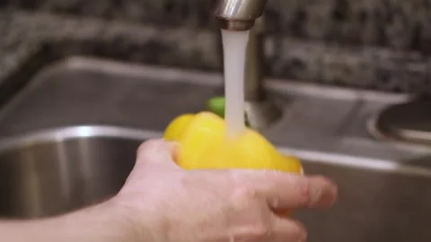 Washing yellow pepper Stock-Footage 281905805