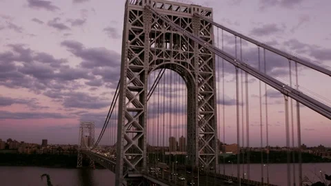 Washington Bridge At Dusk with traffic on it Stock Footage 243621788
