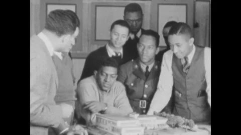 Washington DC 1930s: Man teaches students in classroom while pointing at model Stock Footage 329585328
