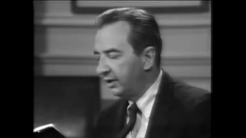 WASHINGTON DC - 1960s - John Frederick Nims begins reading a poem about hatred Stock Footage 340652040