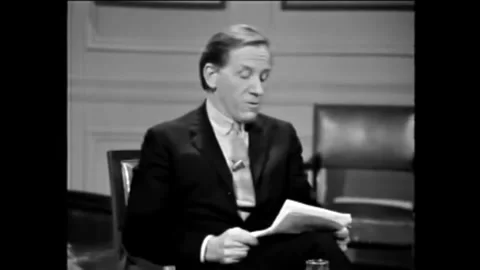 WASHINGTON DC - 1960s - Peter Taylor reads a humorous portion of a short story Stock Footage 340651471
