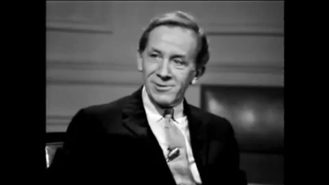 WASHINGTON DC - 1960s - Peter Taylor asks John Updike where he gets inspiration Stock Footage 340651654