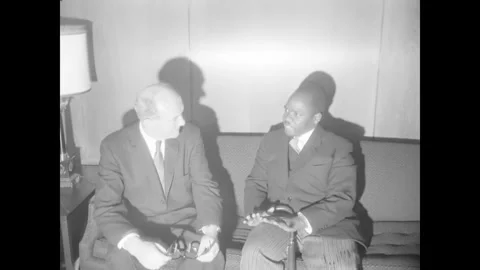 WASHINGTON DC - 1961 - Uganda's prime minister Benedicto Kiwanuka meets with Stock Footage 340590366