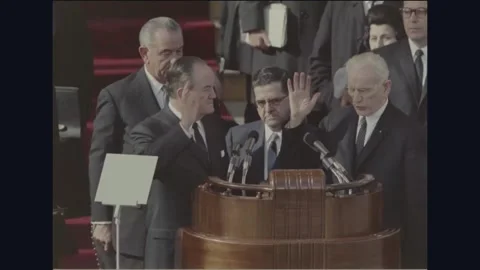 WASHINGTON DC - 1965: Johnson Inauguration — Humphrey takes oath 動画素材 342589490