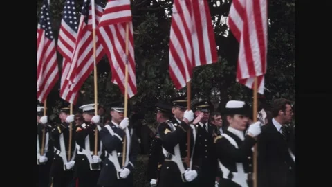 WASHINGTON DC - 1981 - US Naval Academy honor guards holding United States flags Stock Footage 308104212