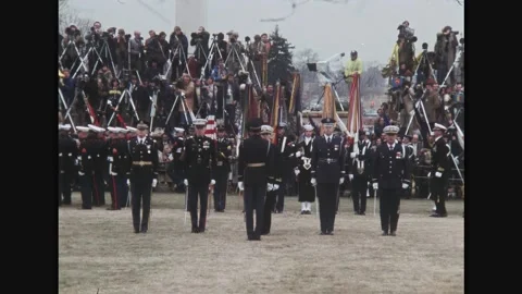 WASHINGTON DC - 1981 - US Naval Academy honor guards holding United States flags Stock Footage 308104233