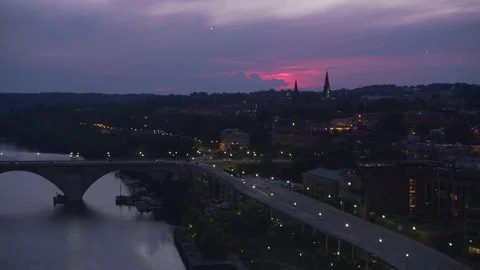 Washington, D.C. circa-2017, Aerial approach to Georgetown University at sunset. Stock Footage 84331725