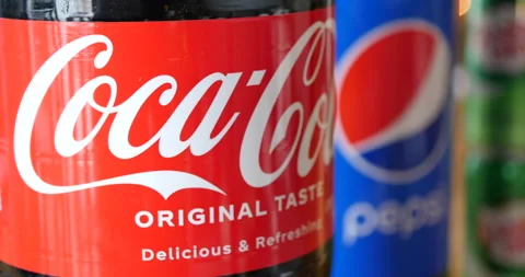 Washington, DC - Circa August 2019: Rack focus across Soda Bottles Stock Footage 232788927