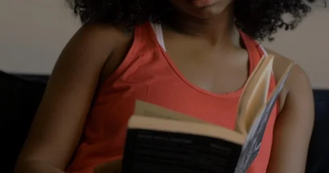 Washington, DC Circa June 2019: Woman Reads Social Empowerment Book Stock Footage 111160889