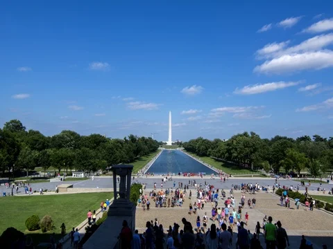 Washington DC famous Mall and pond with Washington Monument in background with Vídeo Stock 75688043