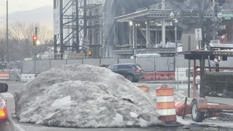 Washington, DC Mound of Snow With Passing Traffic Video stock 328873479