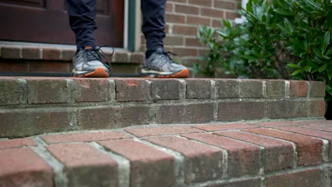 Washington, DC - Sept 2021: Amazon Package Delivery Landing At A Person's Feet Stock Footage 160241577