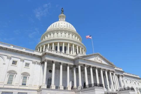 Washington DC, United States landmark. National Capitol building with US flag Stock Photos