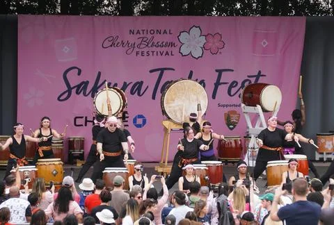Washington D.C, U.S - March 29, 2025 - Energetic Taiko drummers fill the st.. Stock Photos