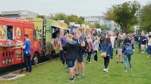 Washington DC, USA, October 2017: A crowd of people near the trucks with food. A Stock Footage 83198223