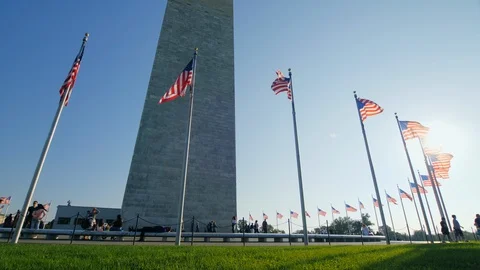 Washington DC, USA, October 2017: Tourists are resting near the Washington Stock Footage 103950189