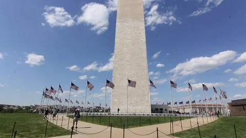 Washington Monument &amp; flags -tilts Stock Footage 105767736