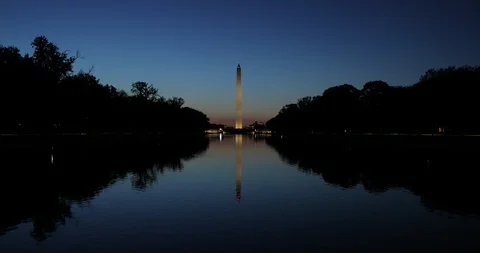 Washington Monument memorial tower in DC sunrise morning dawn Vidéo 114087340