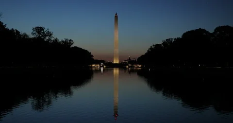 Washington Monument memorial tower in DC sunrise morning Vidéo 114087408