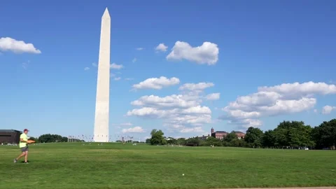 Washington Monument from a moving vehicle. Iconic landmark in Washington Stock Footage 209889486