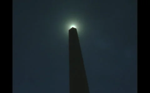 Washington Monument seen backlit by sun Video stock 242497814
