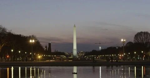 Washington monument time lapse at sunset with light streaks from cars Stock Footage 78653459