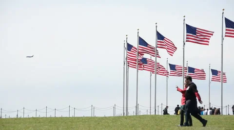 The Washington Monument's flags waving in the wind. (1) Stock Footage 2686065