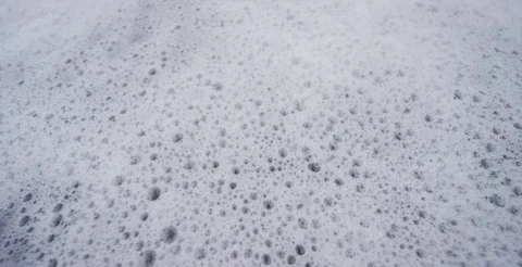 Washington - Ocean Waves Foam Over Rocks on Beach - 6K Slow Motion Stock-Footage 113244756