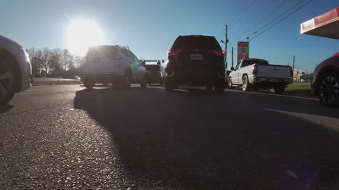 Washington Road in Augusta Georgia ground view stopped traffic and sun Stock Footage 148596451