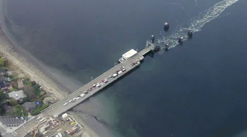 Washington State Ferry Leaving Dock in Puget Sound - Aerial Stock Footage 37019594