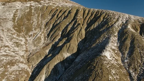 Washouts in the ground with snow Stock Footage 123096233