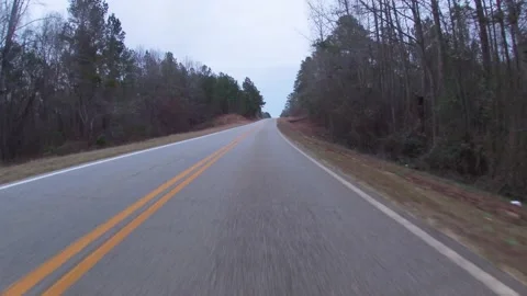 Waste and trash discarded on the side of a rural road in the south 2 Stock Footage 147002713