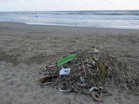 Waste on the beach: lots of  plastic causing sea pollution Stock Photos