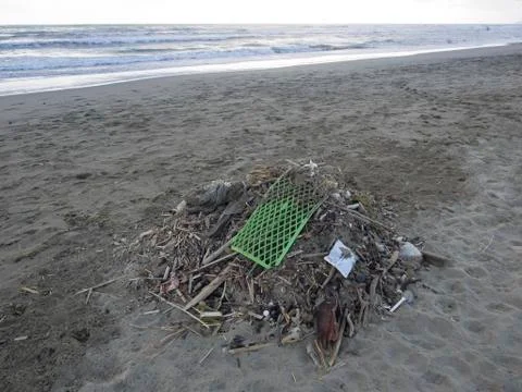 Waste on the beach: lots of  plastic causing sea pollution Stock Photos